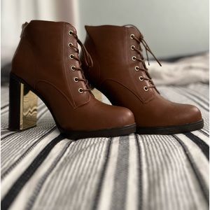 Torrid brown high heel boot lace up